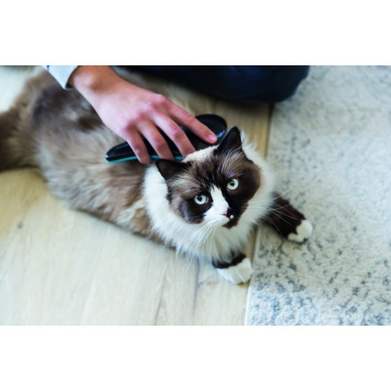 Щітка-пуходерка Trixie для собак м_яка пластикова 19 см